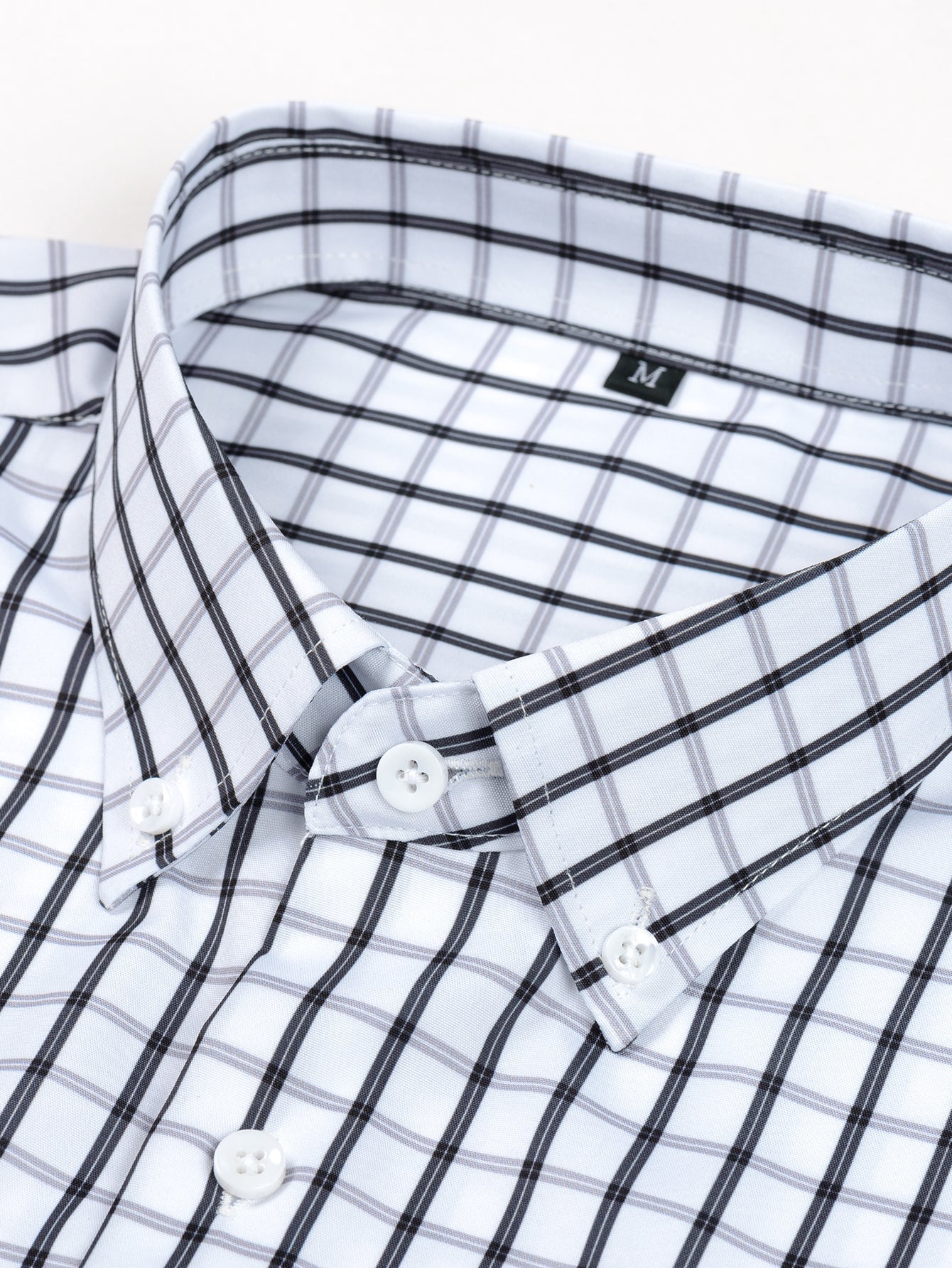 Chemise à carreaux à boutons et à manches longues