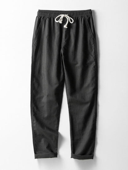 Polo en tricot rayé avec col en V & pantalon en lin
